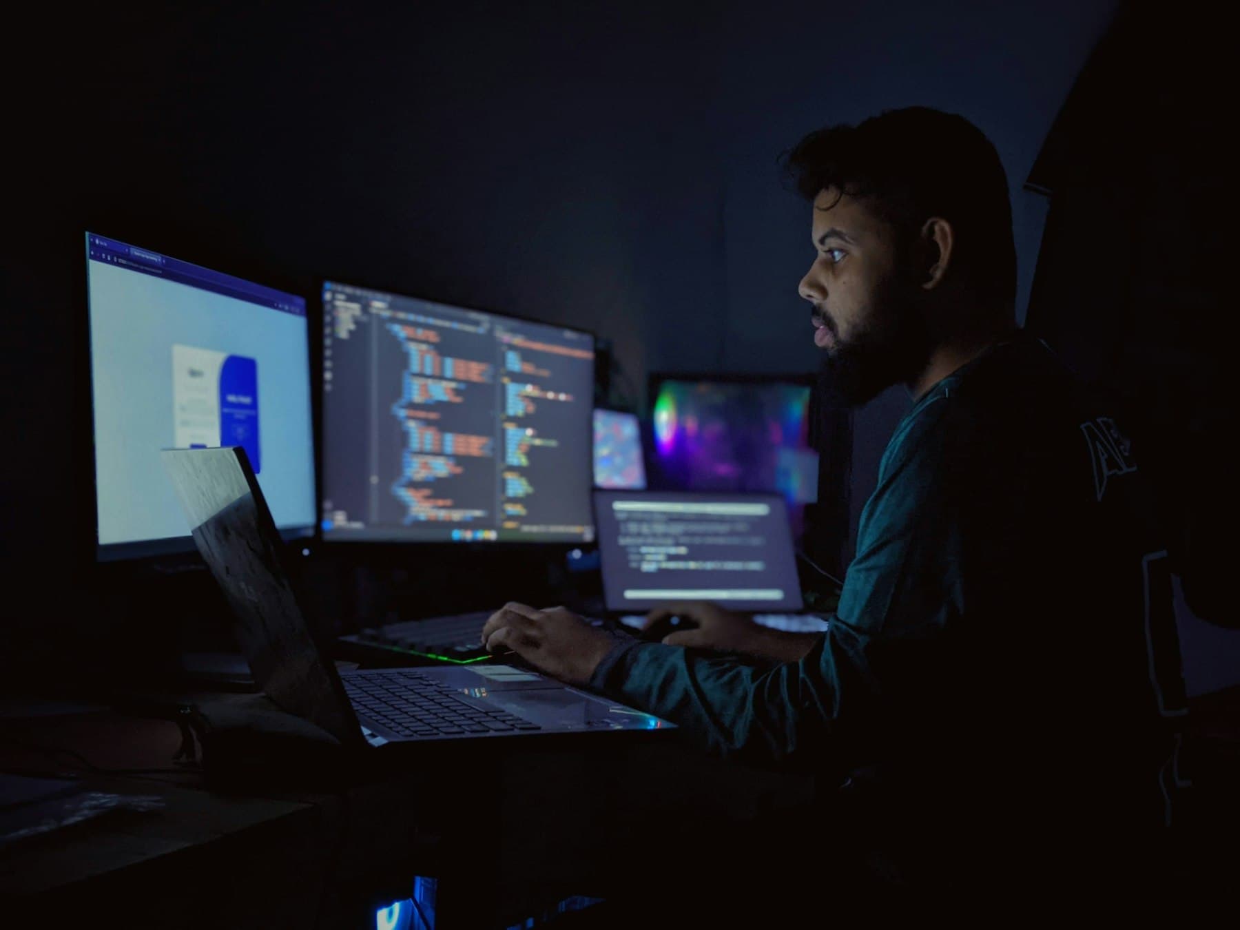 Engineer reviewing code at a workstation